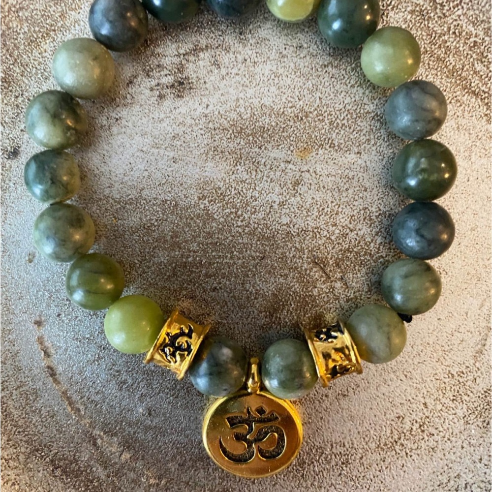 Elegant Chinese Jade Bracelet with Round Beads and Decorative Accents